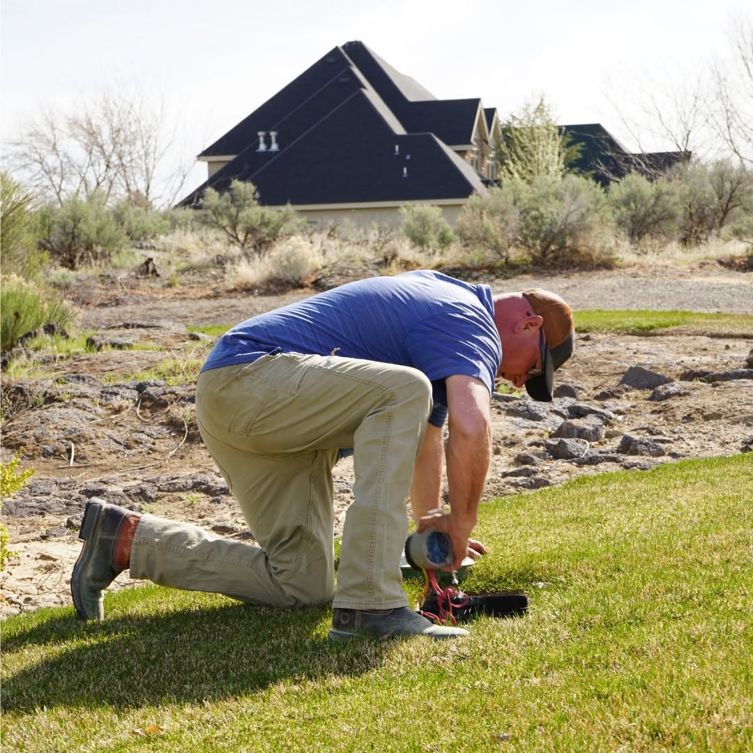 Brad Hanks of Hanks Custom Lawn Care working on a lawn in the Magic Valley