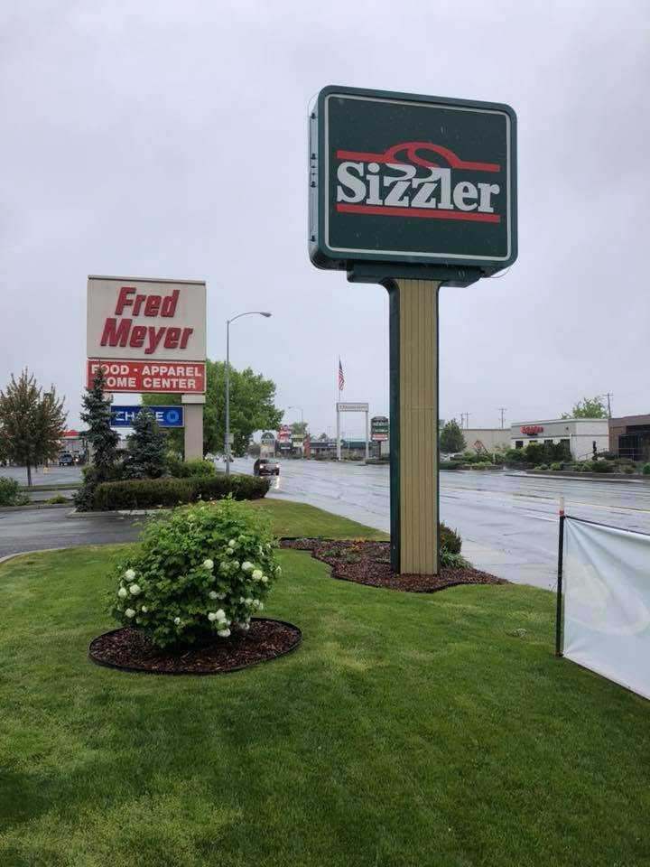 Commercial property landscaping near Sizzler and Fred Meyer